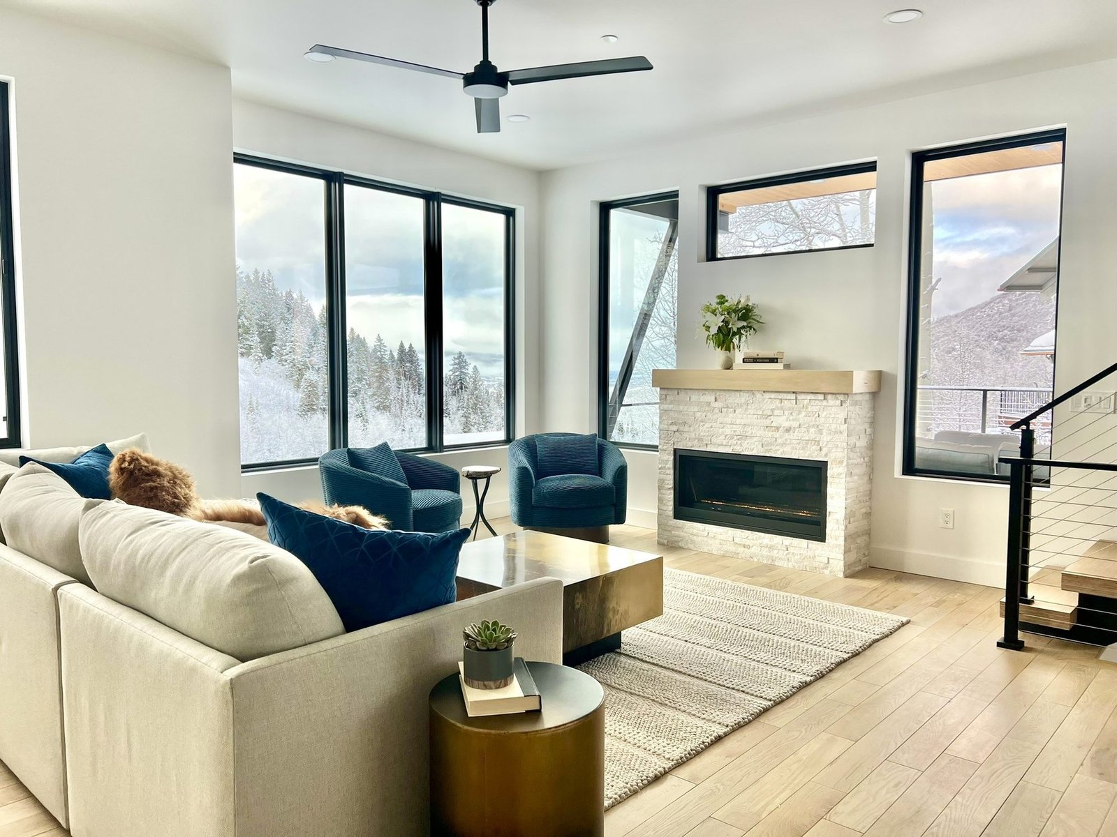 Bright second view of the living room and its large windows
